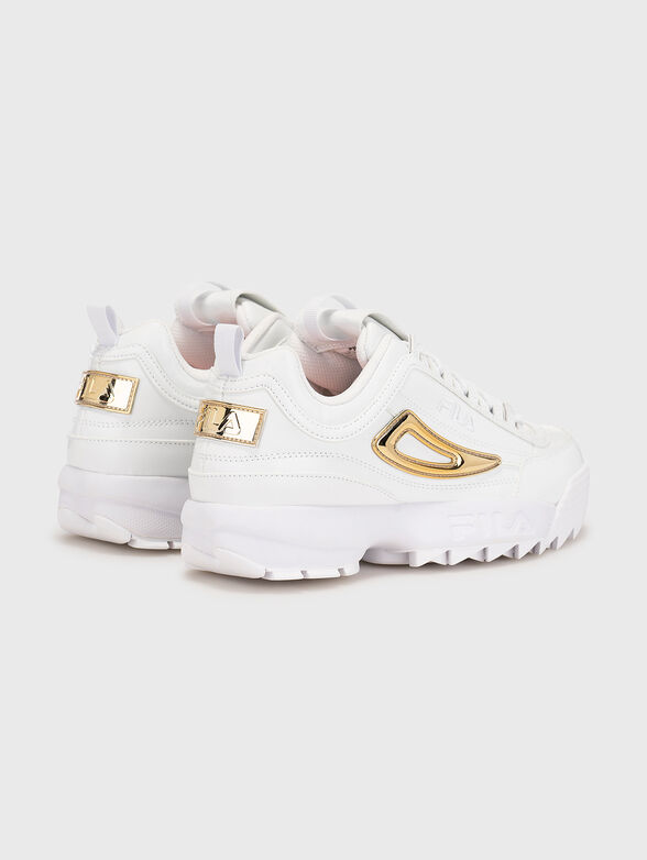 Fila disruptor gold and white on sale
